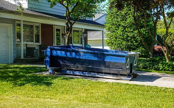 residential dumpsters can be placed on a driveway or lawn, but safety measures must be required to avoid damage to the property